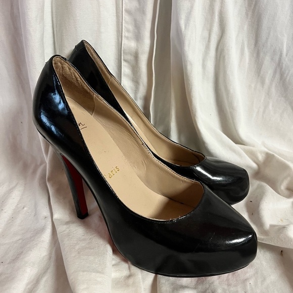 Christian Louboutin Shoes - Christian Louboutin Black Patent
Rolando Pumps size 39